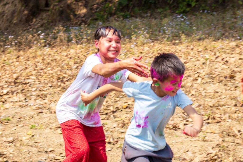 Kids celebrating holi at Khasrang Village