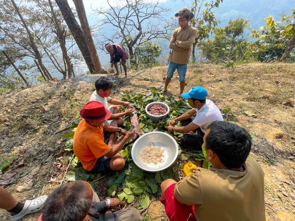 Preparing goat meat after worshipping at Khasrang Village