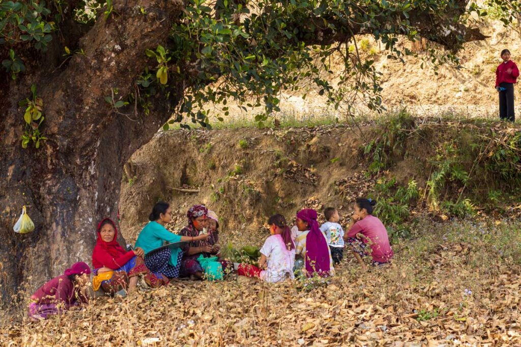 Villagers gathered for holi celebration collecting money